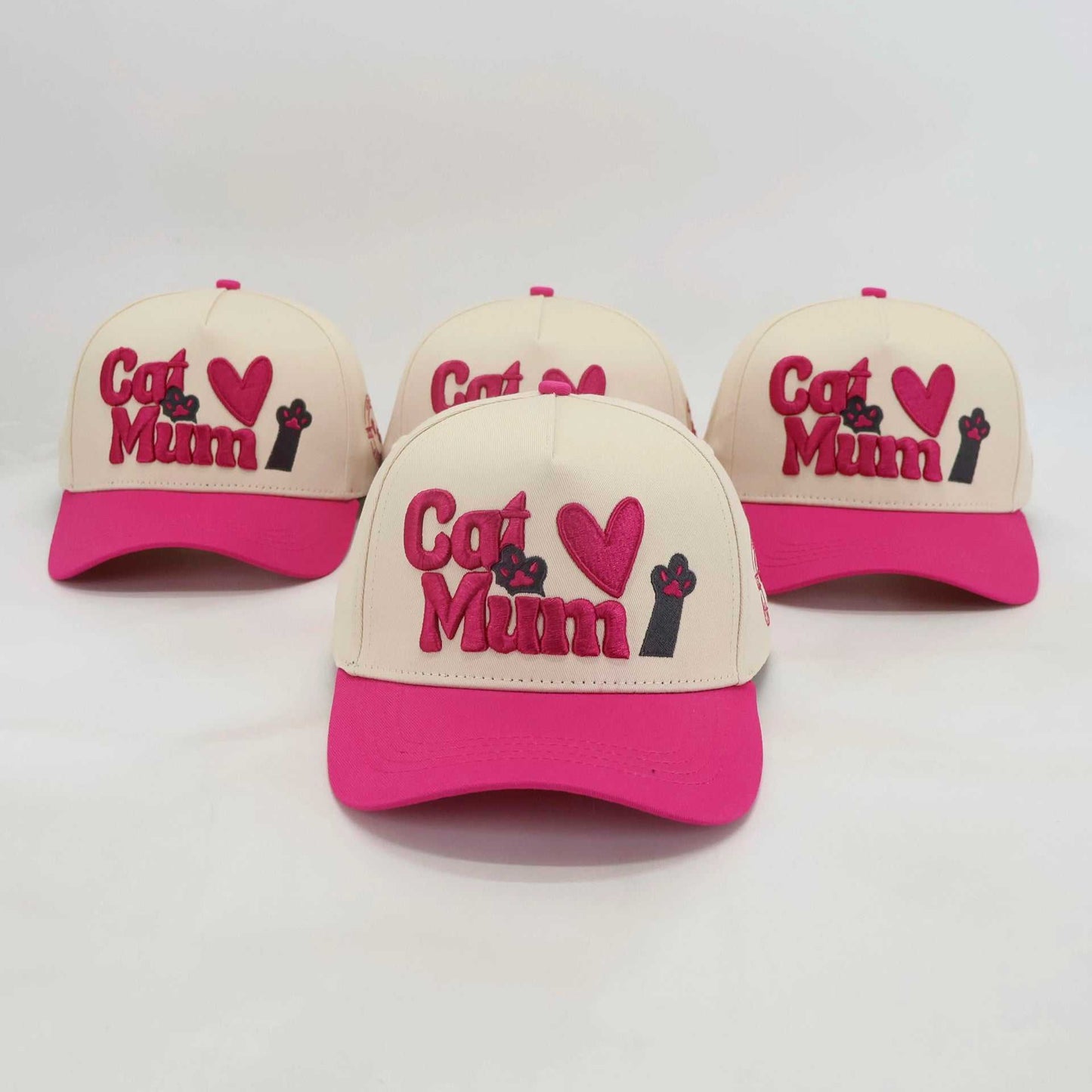 Adjustable beige and pink baseball hats embroidered with "Cat Mum" design for pet lovers