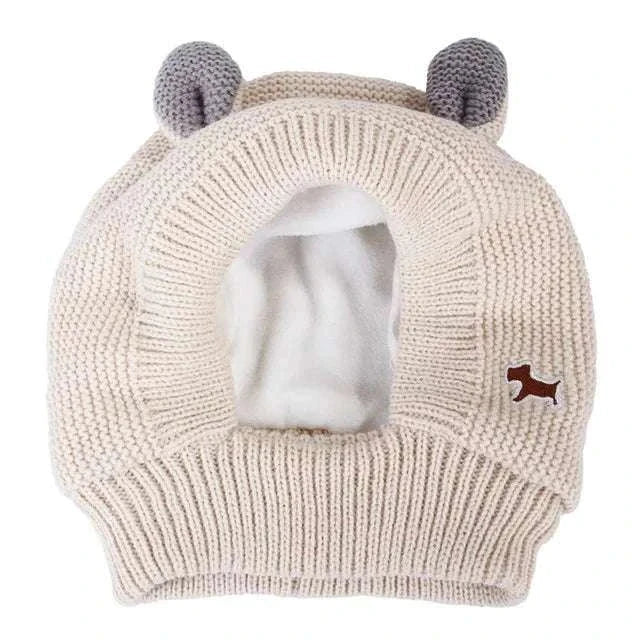 Anxiety relief ear protection knitted hat for dogs with noise-cancelling, warm, soft fabric, and cute ear design.