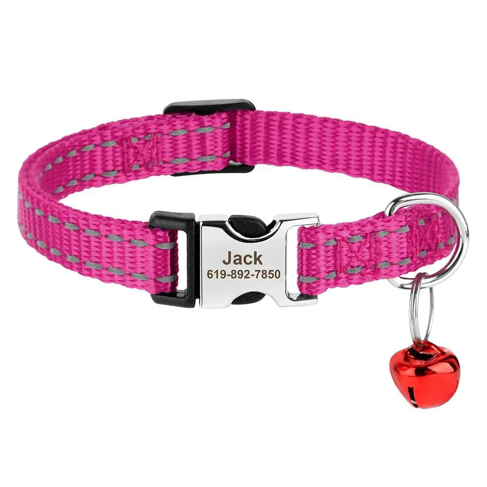Personalised adjustable cat collar in pink nylon with custom nameplate and red safety bell