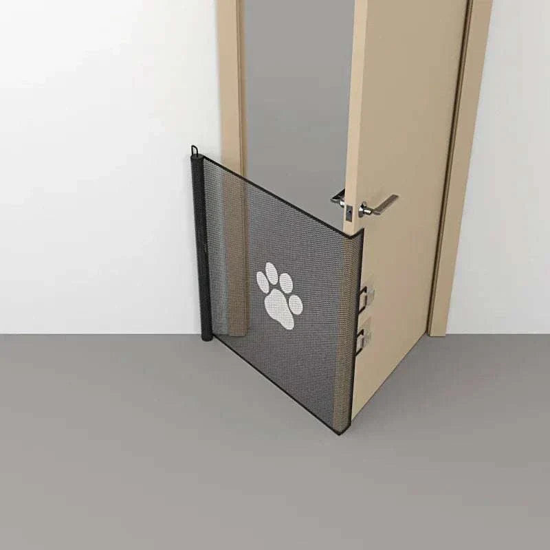 Automatic retractable pet gate fence installed in doorway with paw print design