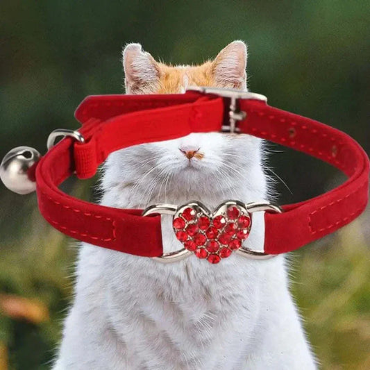 Pretty Kitty's red adjustable cat collar with sparkling heart-shaped bell and durable polyester design