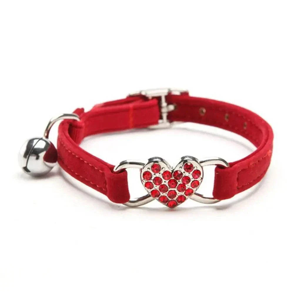 Pretty Kitty's red adjustable cat collar with sparkling diamond heart bell and silver buckle for safety and style