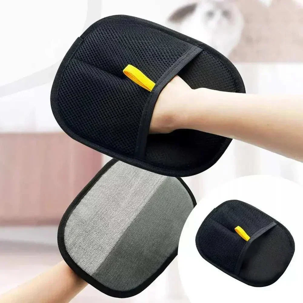 Black reusable and washable eco-friendly pet hair removal glove with breathable mesh and two-way design for cleaning fur from clothing and furniture.