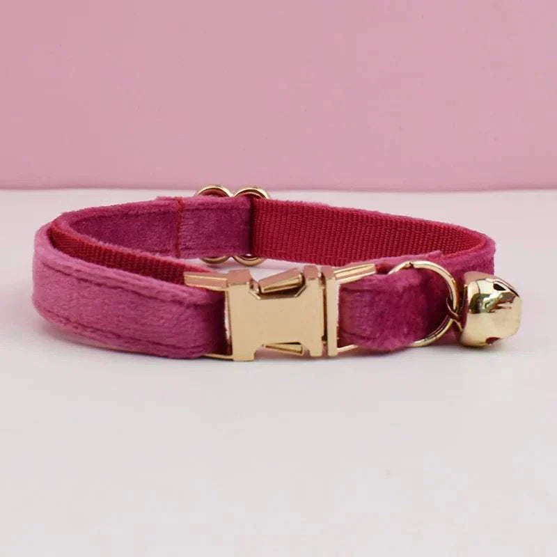 Luxury velvet cat collar in deep pink with gold buckle and bell, adjustable and soft velvet material