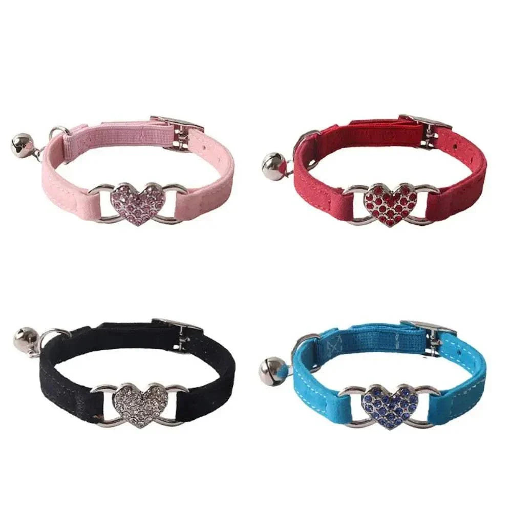 Pretty Kitty's adjustable cat collars with sparkling heart bell in pink, red, black, and blue colors for stylish pet safety