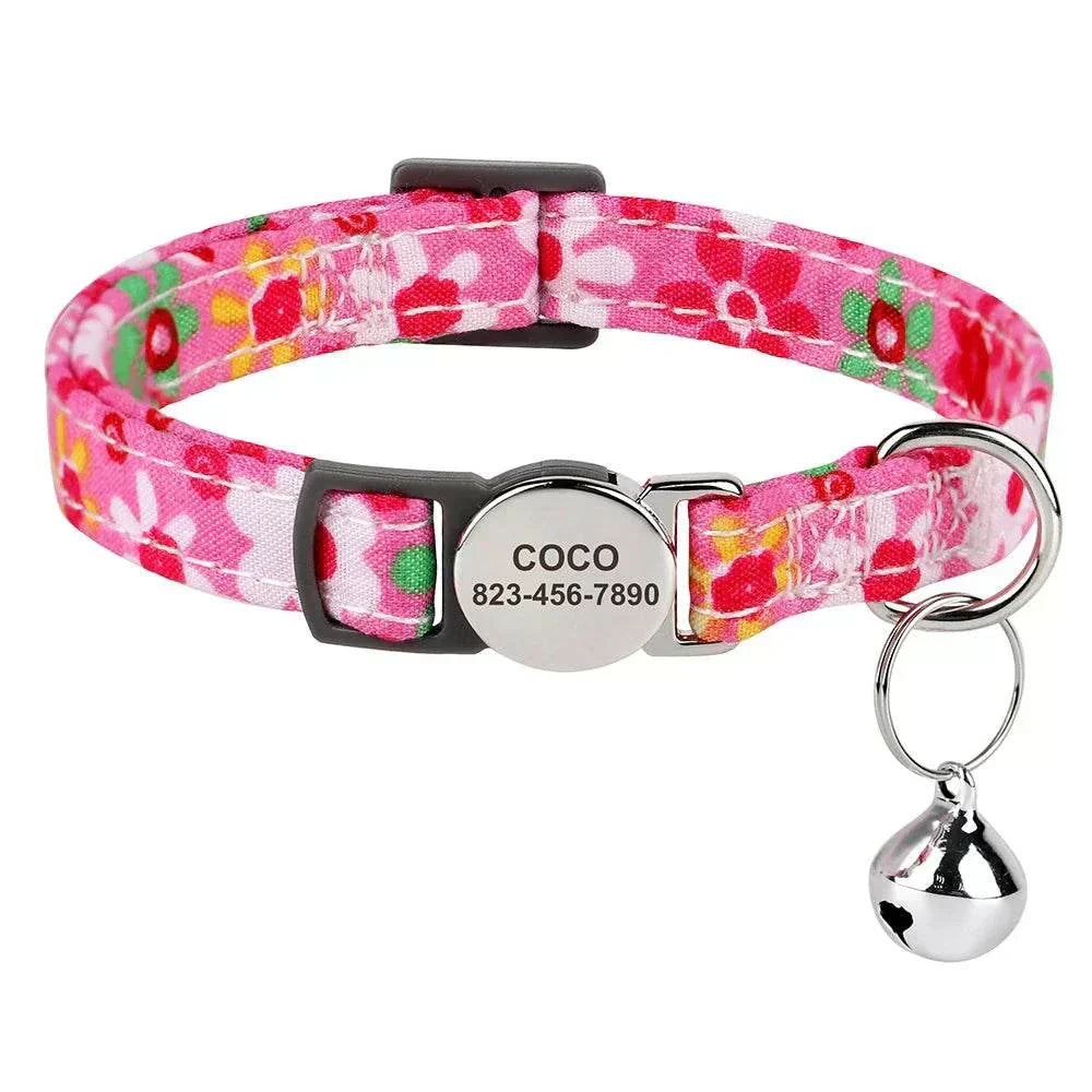 Personalised adjustable cat collar in pink floral pattern with custom engraved nameplate and safety bell
