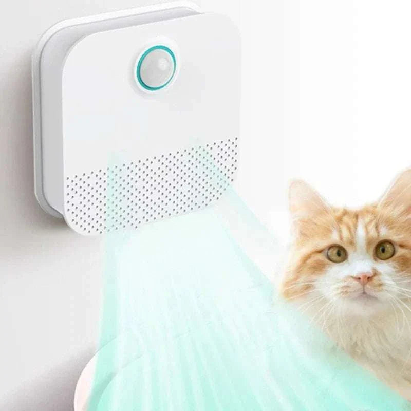 Smart Odor Purifier mounted on wall eliminating pet odors near cat