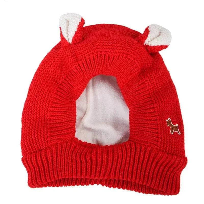 Red knitted anxiety relief ear protection hat for dogs with ear covers and fleece lining
