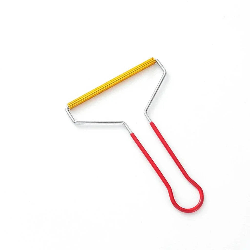 Compact pet hair remover tool with metal construction and yellow roller for lint and fuzz removal on fabrics