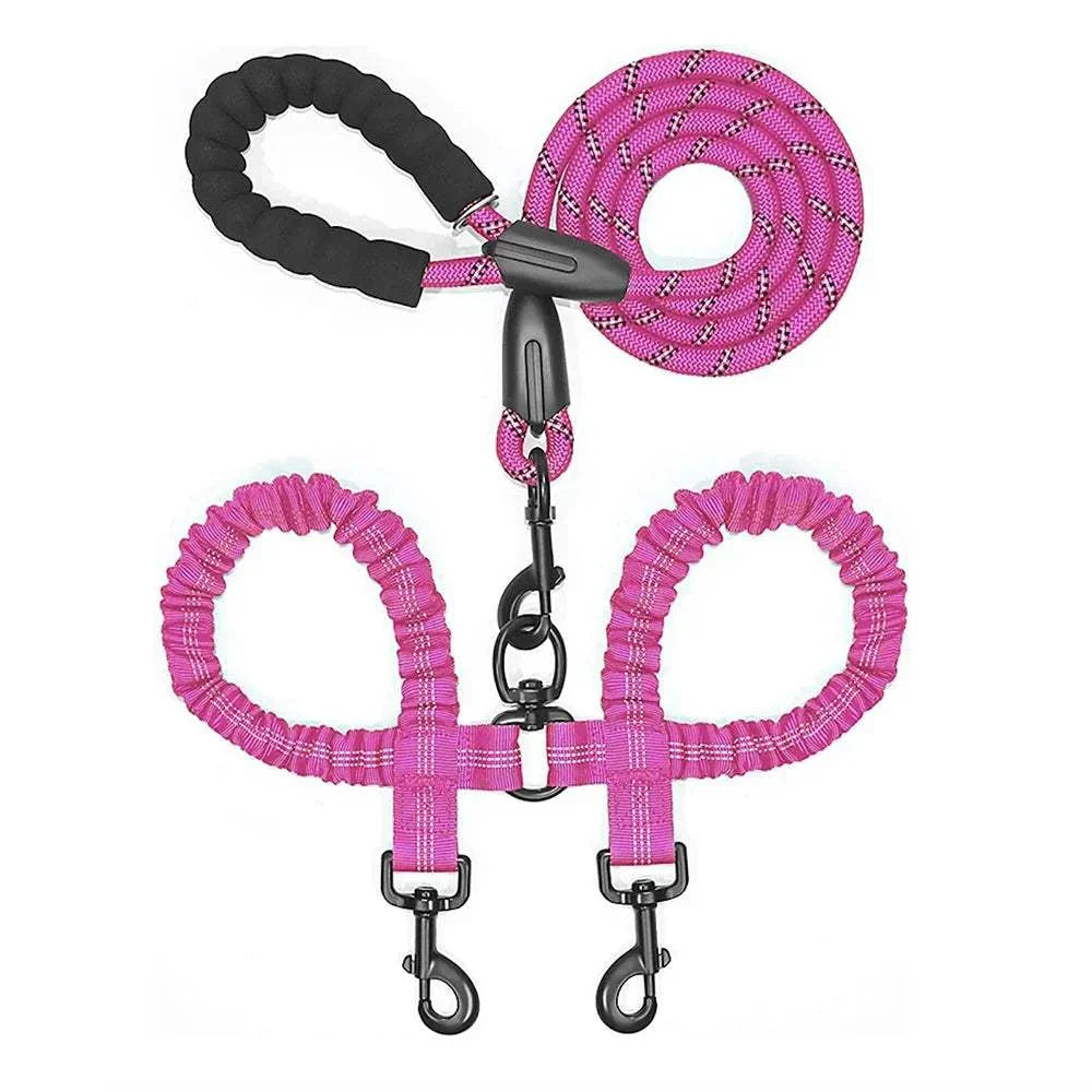 Dual bungee rope leash designed to walk two dogs with shock-absorbing handles and tangle-free swivel clips