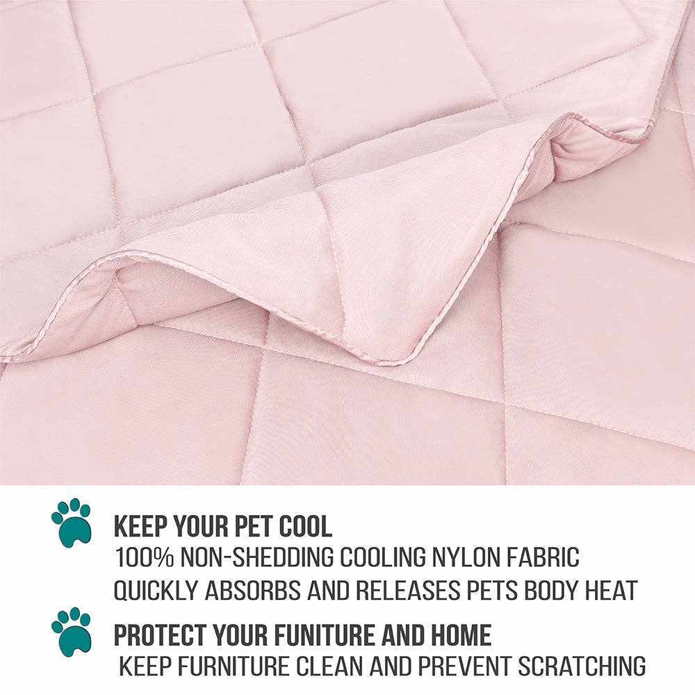 Light pink cooling pet dog blanket made of non-shedding nylon fabric, designed to absorb and release body heat and protect furniture.