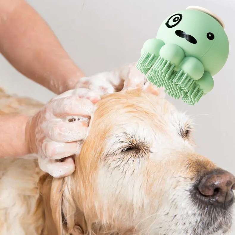 Sherloctopus pet bath massager scrubbing a golden retriever with gentle rubber bristles during bath time