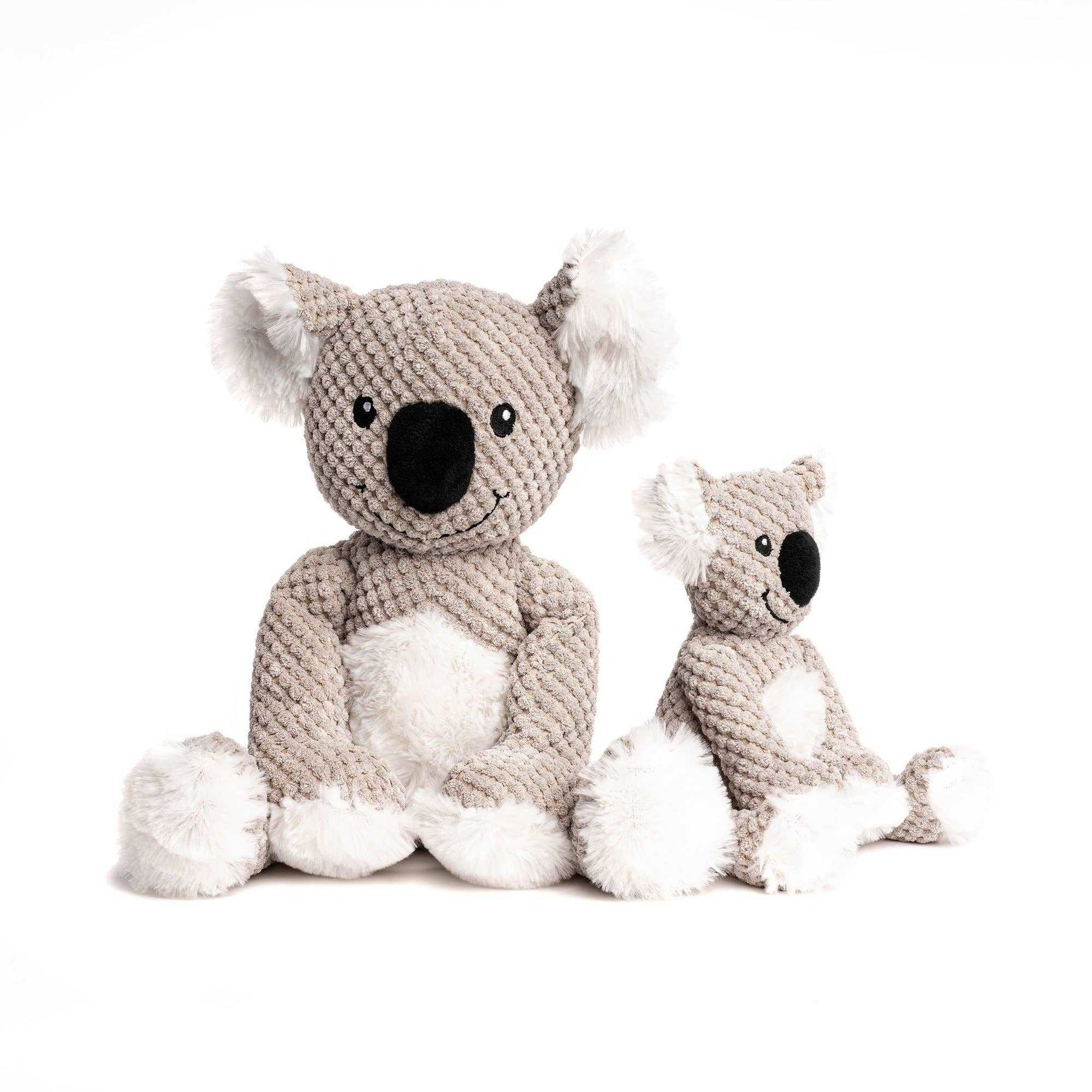 Two sizes of Fabdog Floppy Koala Plush dog toys made of soft pineapple plush fabric with fluffy white accents and black noses