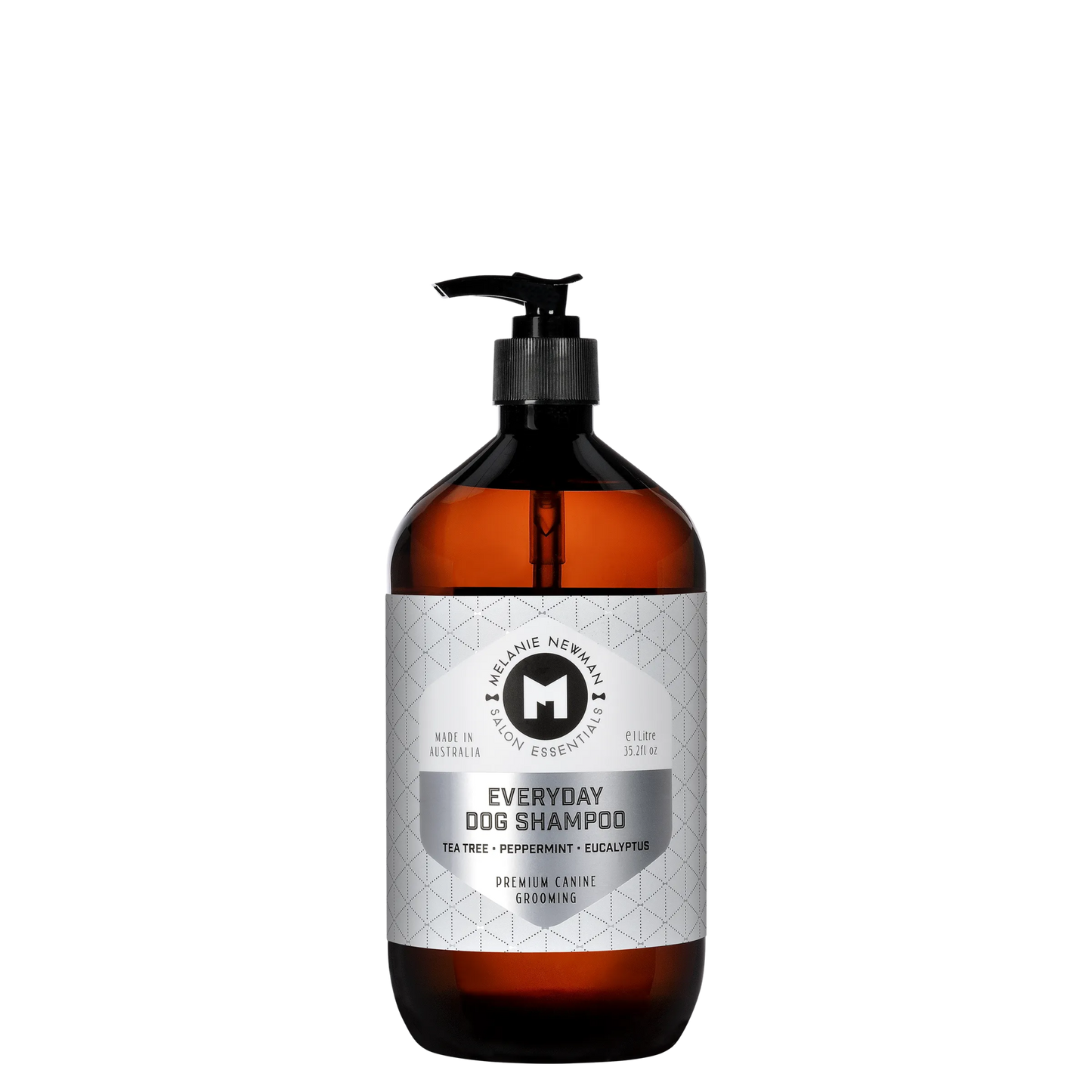 Melanie Newman Everyday Dog Shampoo with Tea Tree, Peppermint, and Eucalyptus in amber bottle.