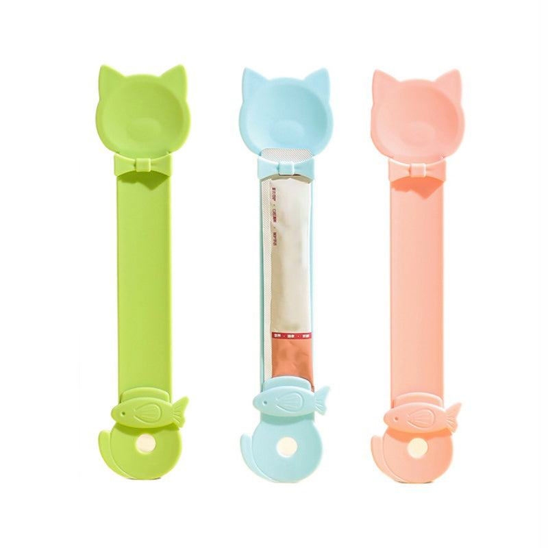 Cat Strip Spoon Feeder designed for clean, safe, and mess-free treat feeding with no sharp edges and secure buckle.
