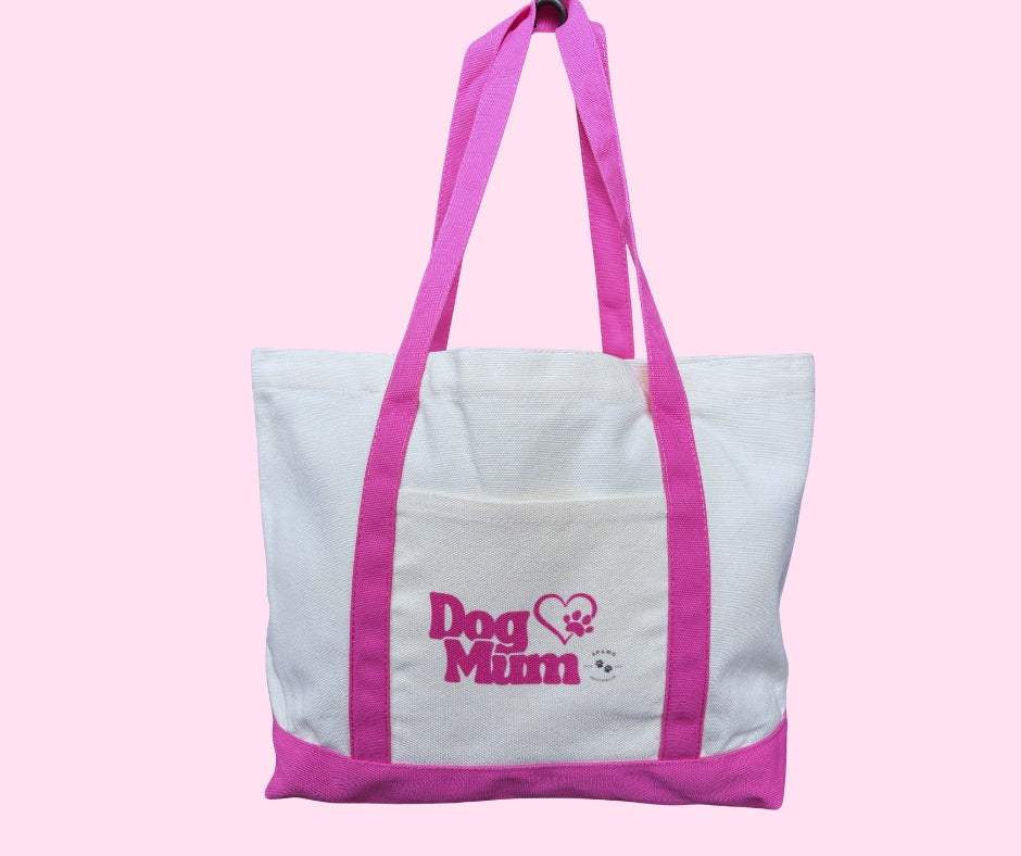 Eco-friendly cotton drill tote bag with pink handles and "Dog Mum" design, reusable and washable.