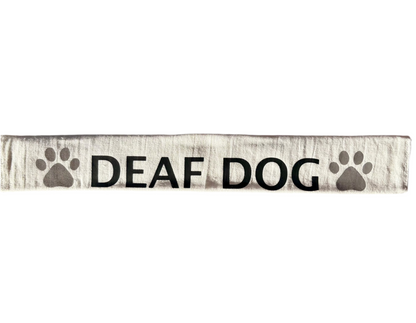 Lead slip for dogs with "DEAF DOG" text and paw prints, cotton material with Velcro attachment for training and safety.