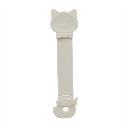 Cat Strip Spoon Feeder in cheerful colors with fixed ring buckle and safe, smooth design for clean, mess-free cat treat feeding