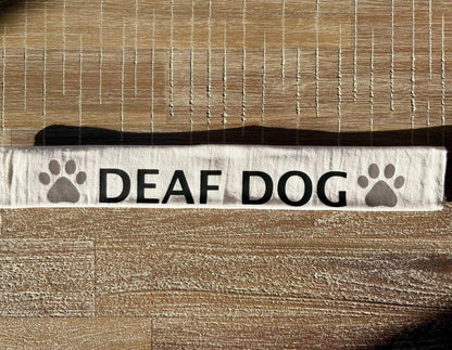 Cotton lead slip for dogs with "DEAF DOG" text and paw prints, designed for safety and communication