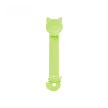 Cat Strip Spoon Feeder in cheerful colors with fixed ring buckle and no sharp edges for safe, clean cat treat feeding