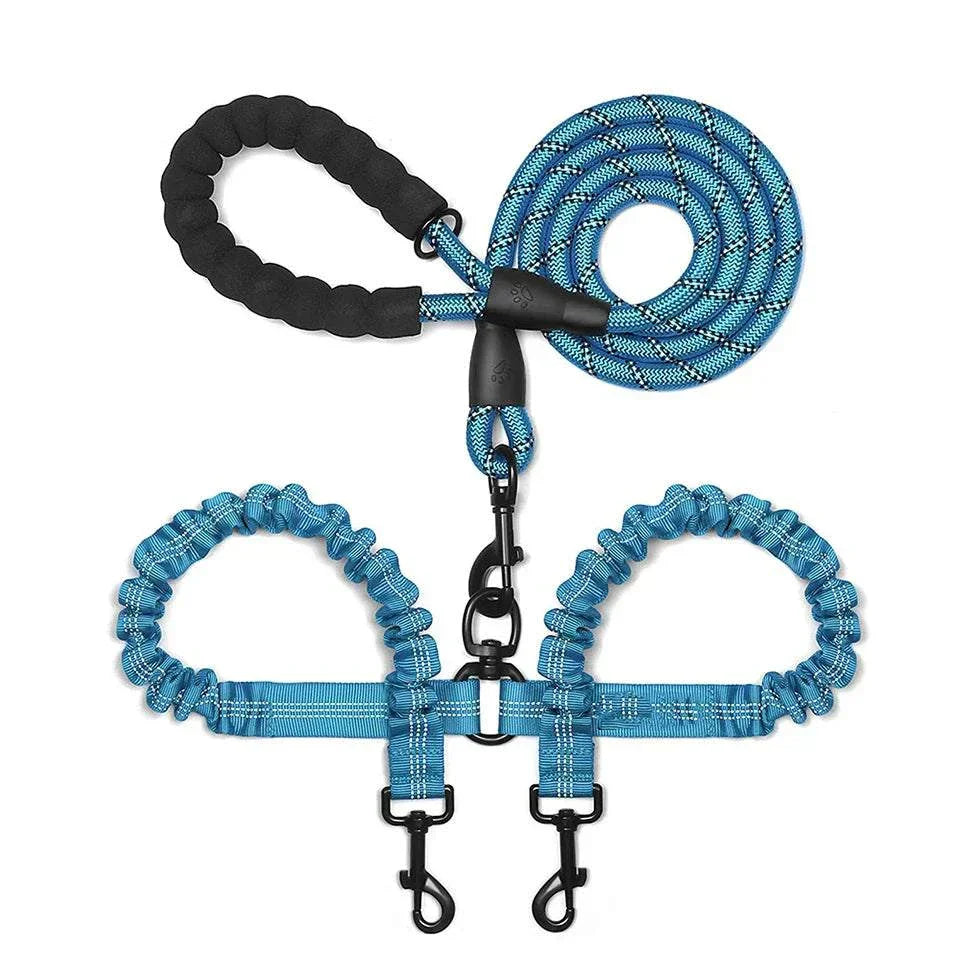 Dual bungee rope leash for walking two dogs with shock-absorbing extensions and comfort grips