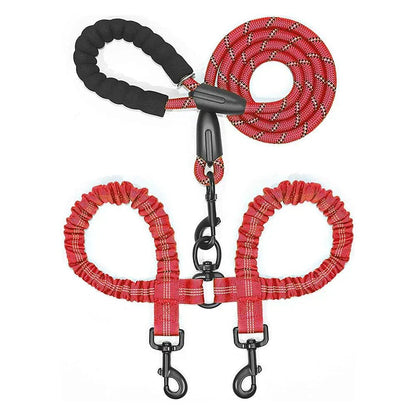 Dual bungee rope leash with padded handles and swivel clasps for walking two dogs comfortably and tangle-free