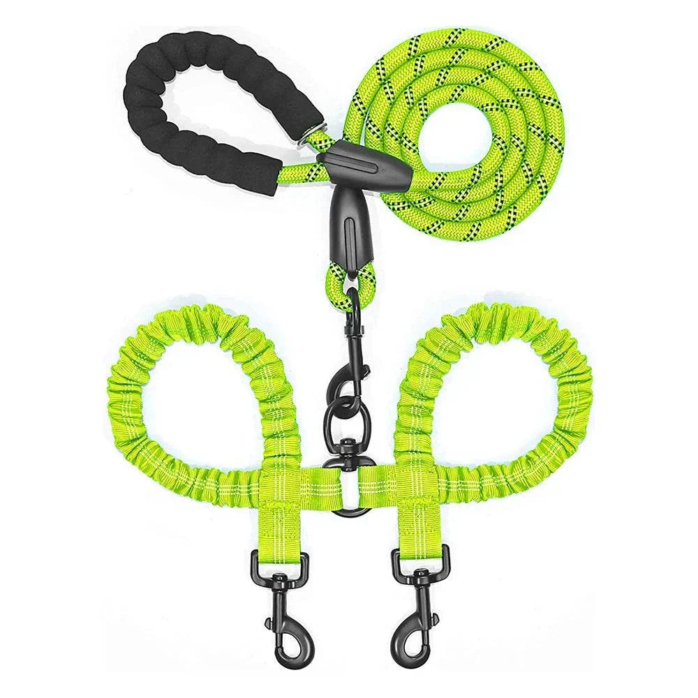 Dual bungee rope leash with shock-absorbing extension and comfort-grip handles for walking two dogs