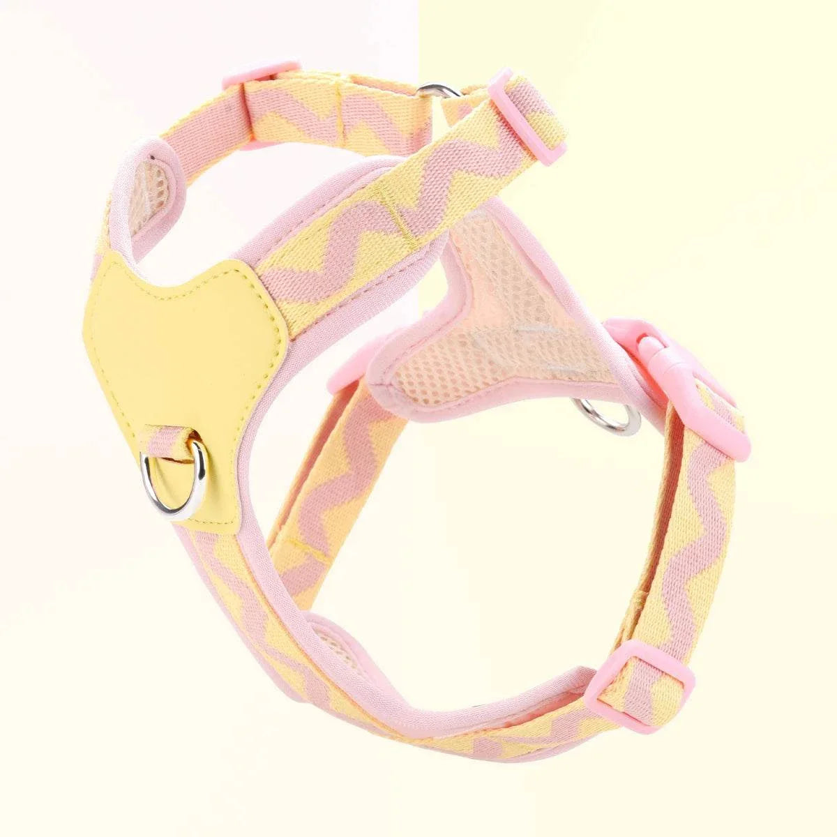 Pink and yellow printed ribbon dog harness with adjustable straps and padded interior for small to medium dogs