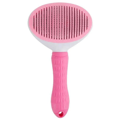 Self cleaning pet grooming tool stainless steel for cats and dogs in pink.