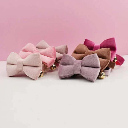 Luxury velvet cat collars with personalized name plate, bell, and bow tie in various soft colors