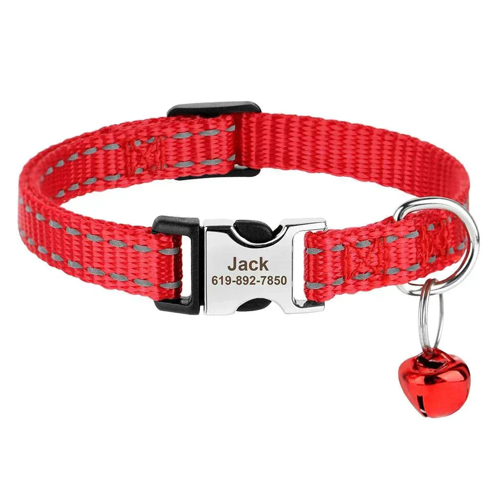 Red personalised adjustable cat collar with custom ID nameplate and bell.