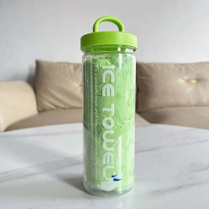 Pet super absorbent drying towel rolled inside a transparent storage bucket with green lid on a white table.