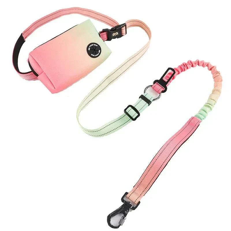 Reflective dog bungee leash with adjustable waist belt, attached storage bag, and poop bag dispenser in pastel colors