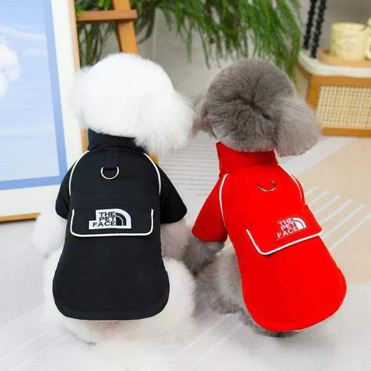 Dog waterproof fleece jacket in red and black, with traction ring for easy walks.