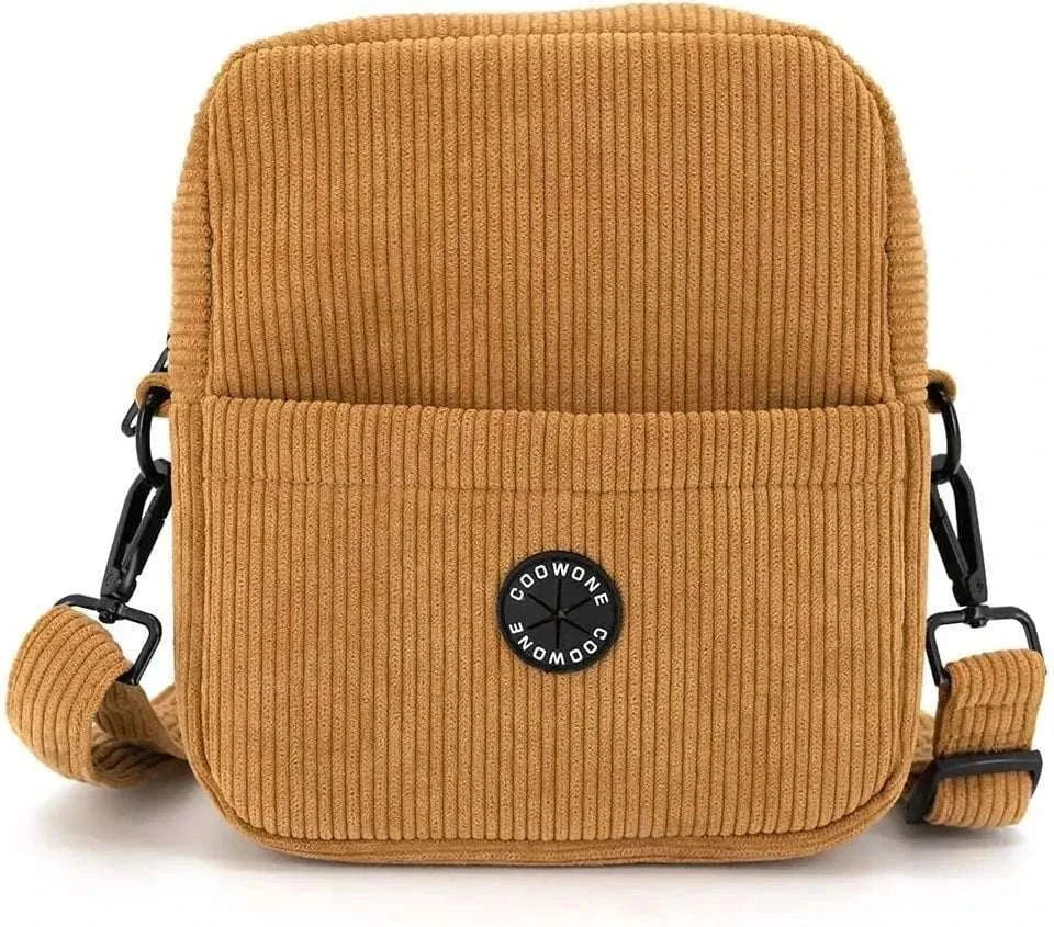 Corduroy velvet dog treat pouch with adjustable strap, built-in poop bag dispenser.