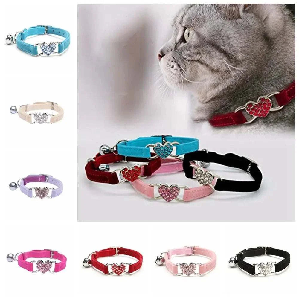 Adjustable cat collar with diamond heart bell, available in multiple colors.