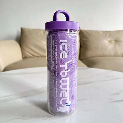 Purple pet super absorbent drying towel in clear portable storage bucket on white table