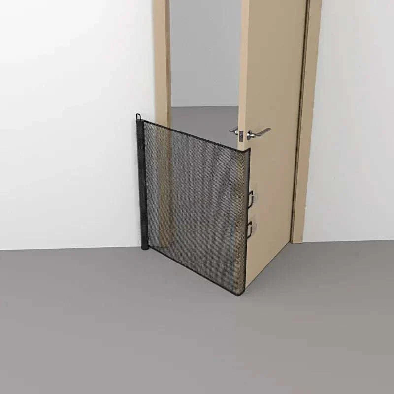 Automatic retractable pet gate fence installed in a doorway for indoor pet safety.