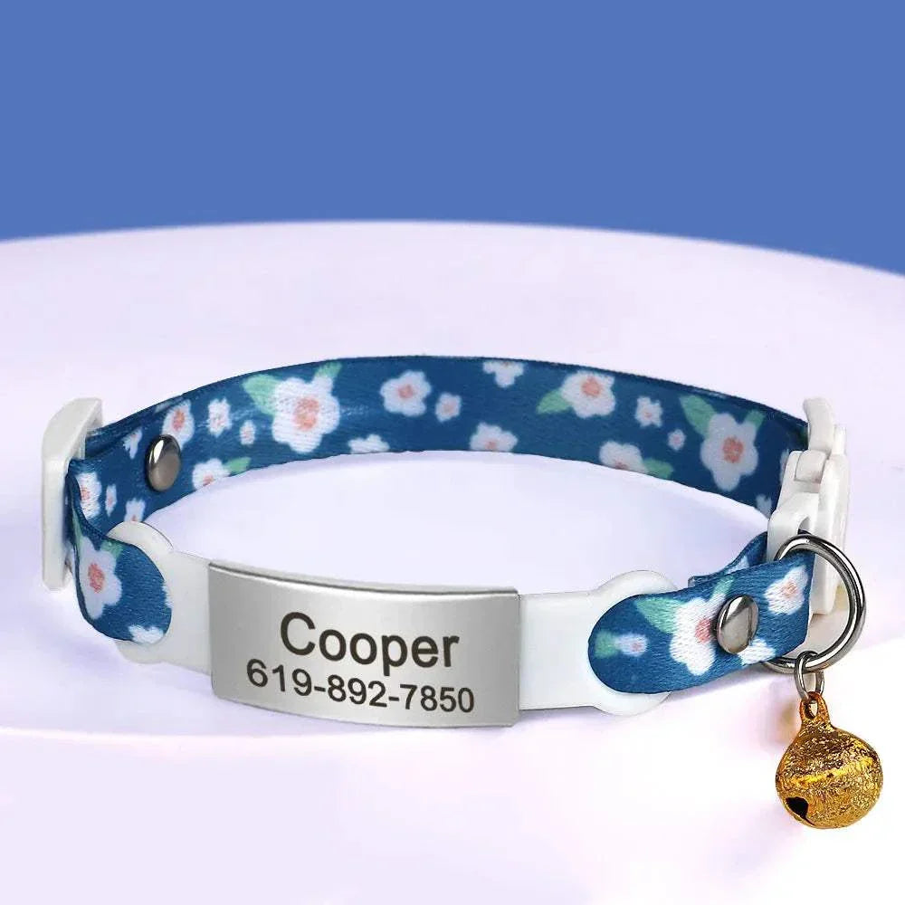 Personalised 1cm width cat collar with bell and breakaway design, featuring flower pattern and engraved name tag.