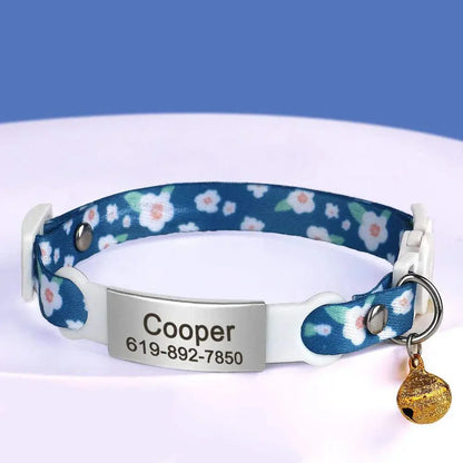 Personalised 1cm width cat collar with bell and breakaway design, featuring flower pattern and engraved name tag.