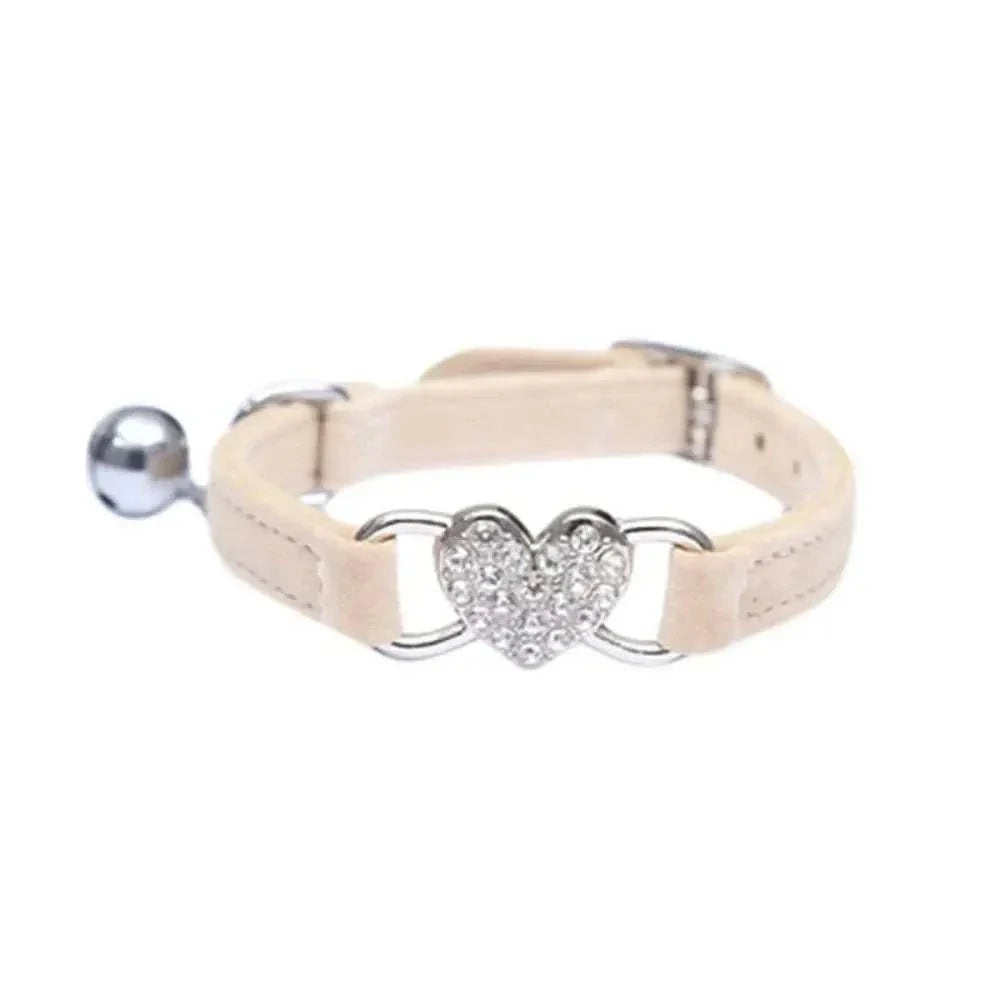 Pretty Kitty's adjustable cat collar with diamond heart bell in beige.