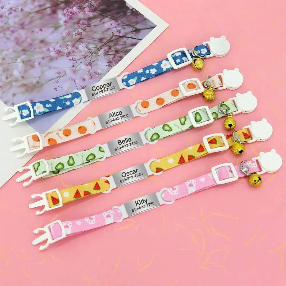 Personalised 1cm width cat collar with bell and breakaway clasp, featuring various patterns in flower, avocado, paw print, orange, and watermelon designs.