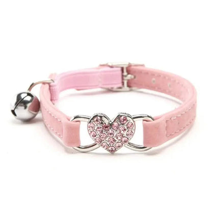 Pretty Kitty's safety diamond heart bell adjustable cat collar in pink with heart charm.