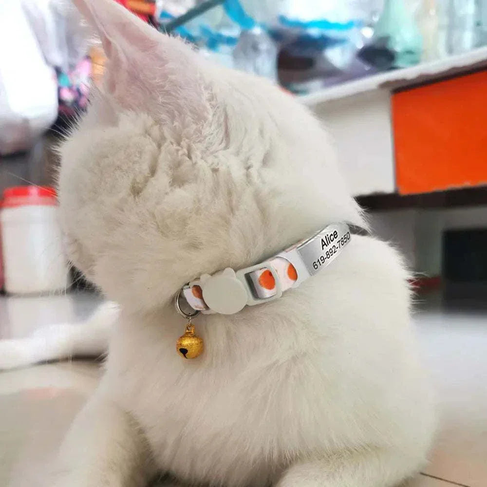 Personalised 1cm width cat collar with bell and safety breakaway design.