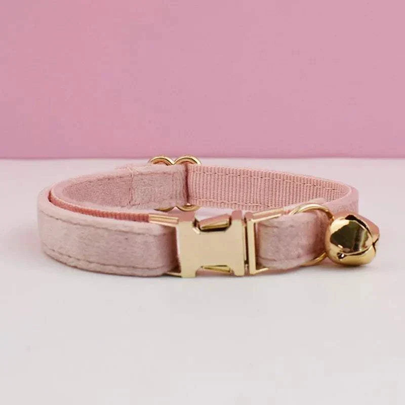 Luxury pink velvet cat collar with gold buckle and bell, adjustable and soft material