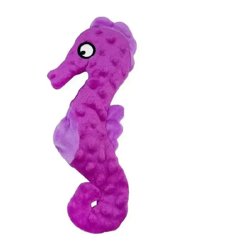 Vibrant pink seahorse-shaped no stuffing dog toy with squeaky and crinkle features.