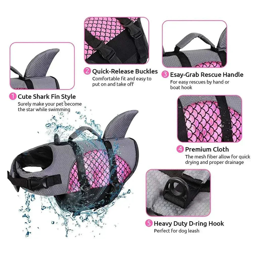 Shark dog life jacket swim vest with shark fin style, quick-release buckles, rescue handle, breathable mesh fabric, and heavy-duty D-ring for leash attachment.