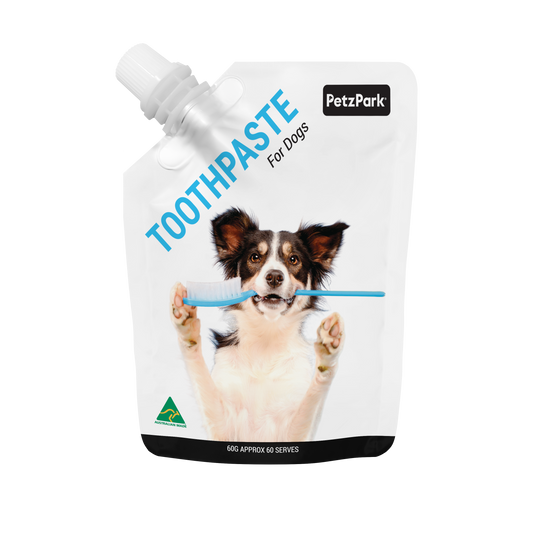 PetzPark Toothpaste for Dogs pouch with a dog holding a toothbrush, designed for plaque, tartar, and bad breath control.