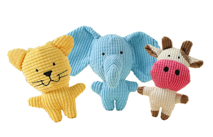 Set of cute crinkle and squeak dog toys shaped like a cow, elephant, and lion made from soft textured fabric.