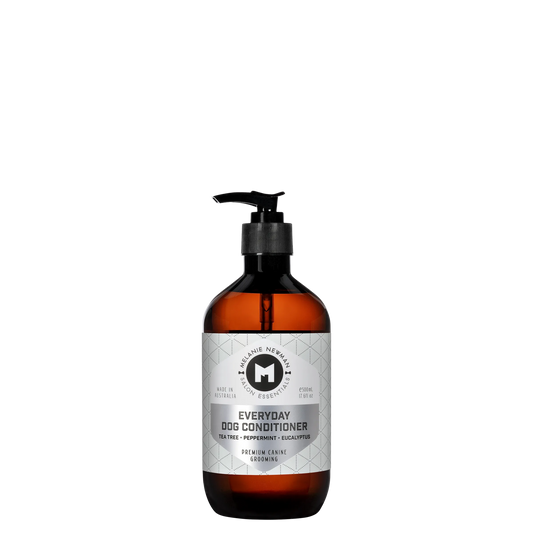 Melanie Newman Everyday Dog Conditioner bottle with Tea Tree, Peppermint, and Eucalyptus scents.